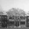 <p><strong>Craftsman-influenced Colonial Revival</strong>: Officers&#39; Quarters (Building 12; built 1910), east facade with prominent porch, view west, ca. 1935.</p>